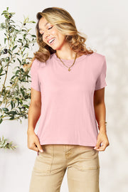Blush pink bamboo crew neck tee with short sleeves and a slit hemline.