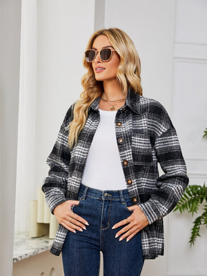 Black and white plaid shacket with oversized button detail and a white t-shirt.