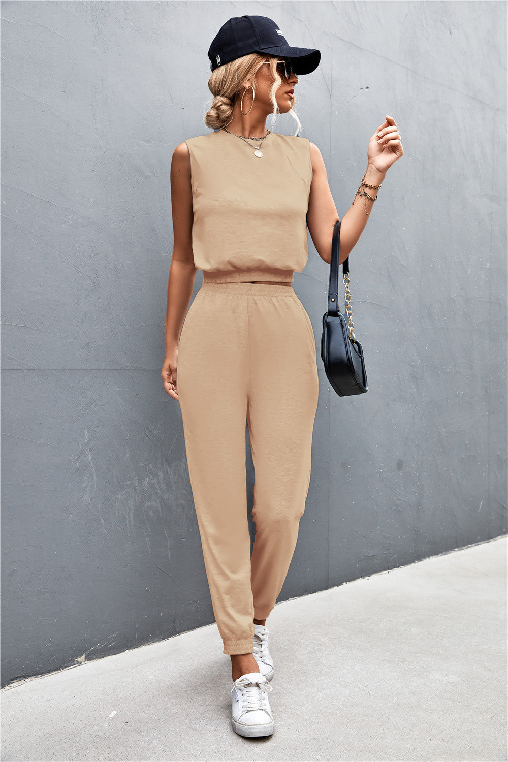Khaki cropped muscle tank and jogger set with elastic waistbands and cuffs.