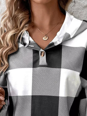 Buffalo plaid V-neck hoodie with button detail in black and white.