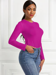 Sculpted ribbed jersey bodysuit in hot pink with long sleeves and a crew neck.