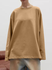Oversized crewneck sweatshirt in tan with voluminous long sleeves.
