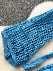 Blue crochet knit tied crop top and high slit skirt set detail.