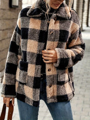 Cozy plaid sherpa trench coat in camel and black check with button front and collar.