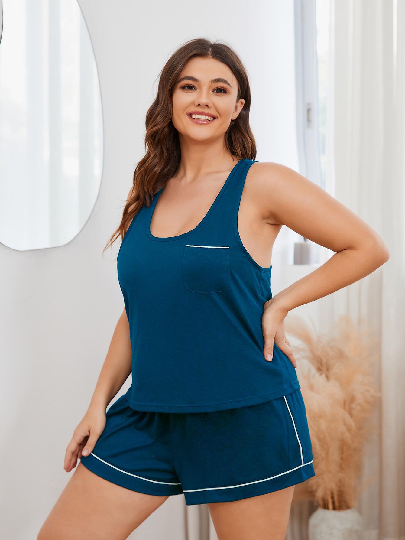 Peacock blue loungewear set with contrast trim racerback tank and shorts.