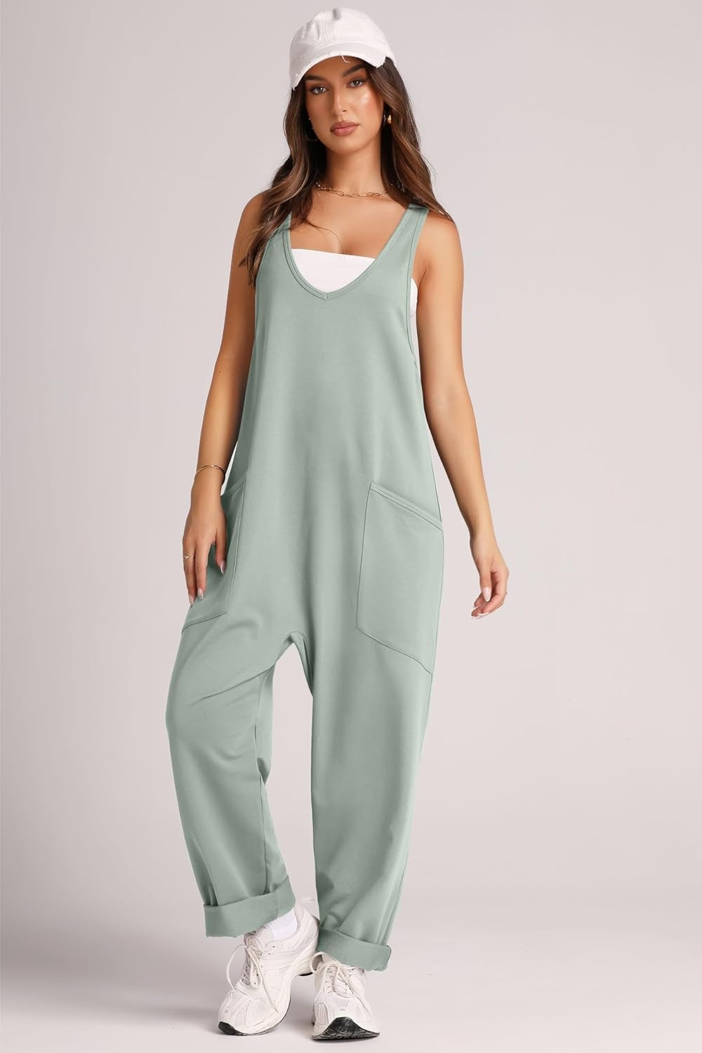 Relaxed fit jumpsuit in Matcha Green with oversized pockets and cuffed hems.