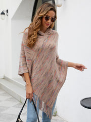 Hooded mélange cape in tan with colorful stripes and fringe detail