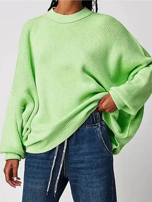 Oversized neon green ribbed knit sweater with drop shoulders and crew neck.