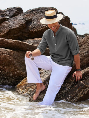 Textured dark gray henley shirt with roll-up sleeves and buttoned collar