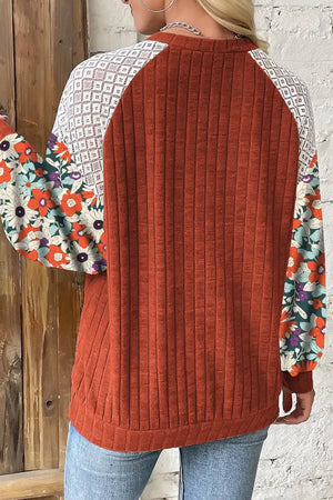 Terracotta ribbed blouse with floral print sleeves and lace yoke detail