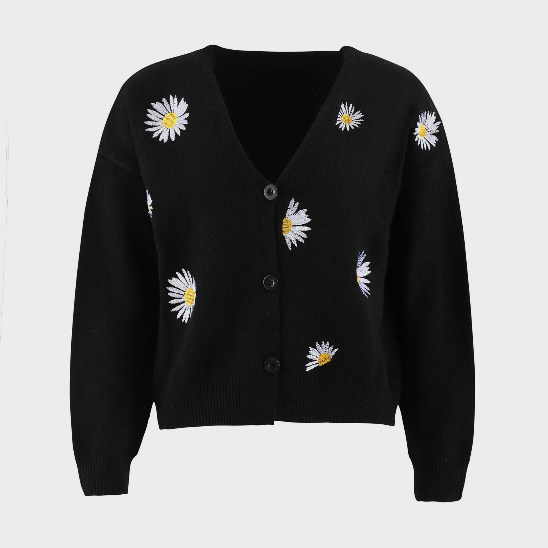 Black V-neck cardigan with allover daisy embroidery and button front.