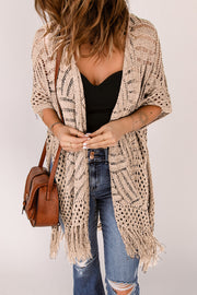Tan open knit chevron fringe cardigan with short sleeves.