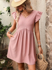A-line dress in bean paste powder with ruffled sleeves and a textured pattern.