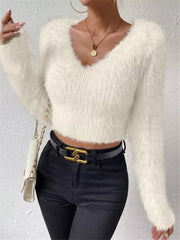White fluffy V-neck knit sweater with long sleeves, cropped length, and acrylic material.