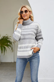 Light gray turtleneck sweater with geometric pattern and long sleeves.