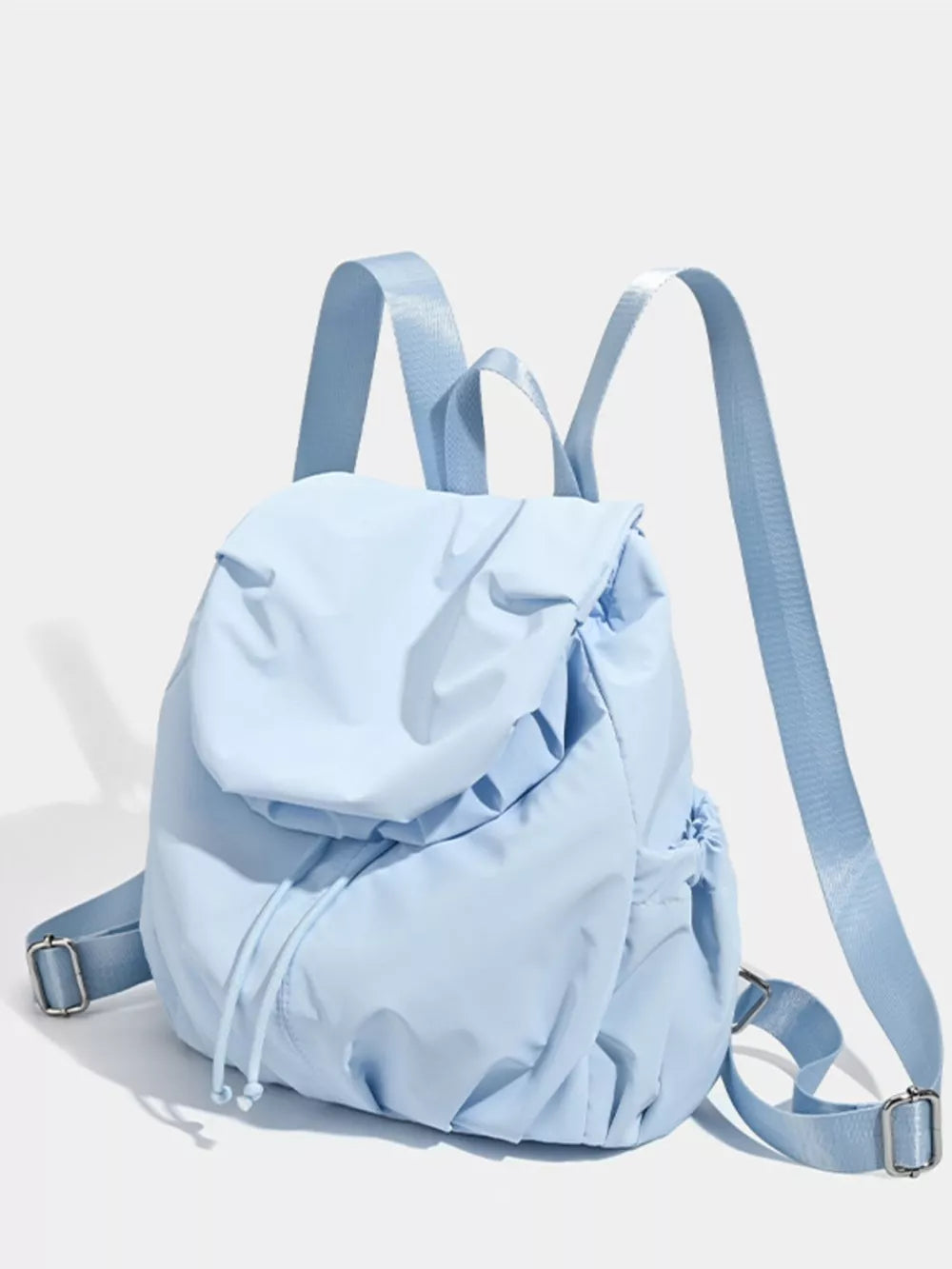 Blue nylon drawstring backpack with flap closure and adjustable straps.