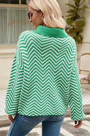 Green and white chevron knit polo sweater with a collar.