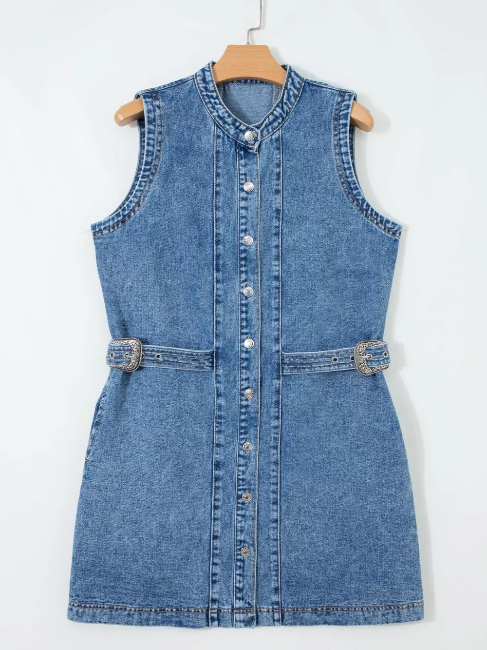 Belted denim dress with button front, mandarin collar, sleeveless, and silver buckle detail.