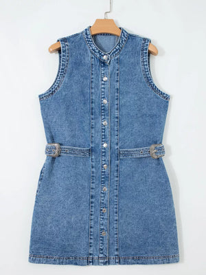 Belted denim dress with button front, mandarin collar, sleeveless, and silver buckle detail.