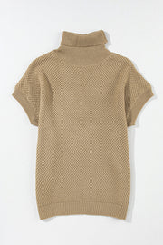 Khaki textured knit turtleneck cap sleeve sweater with a waffle knit pattern.