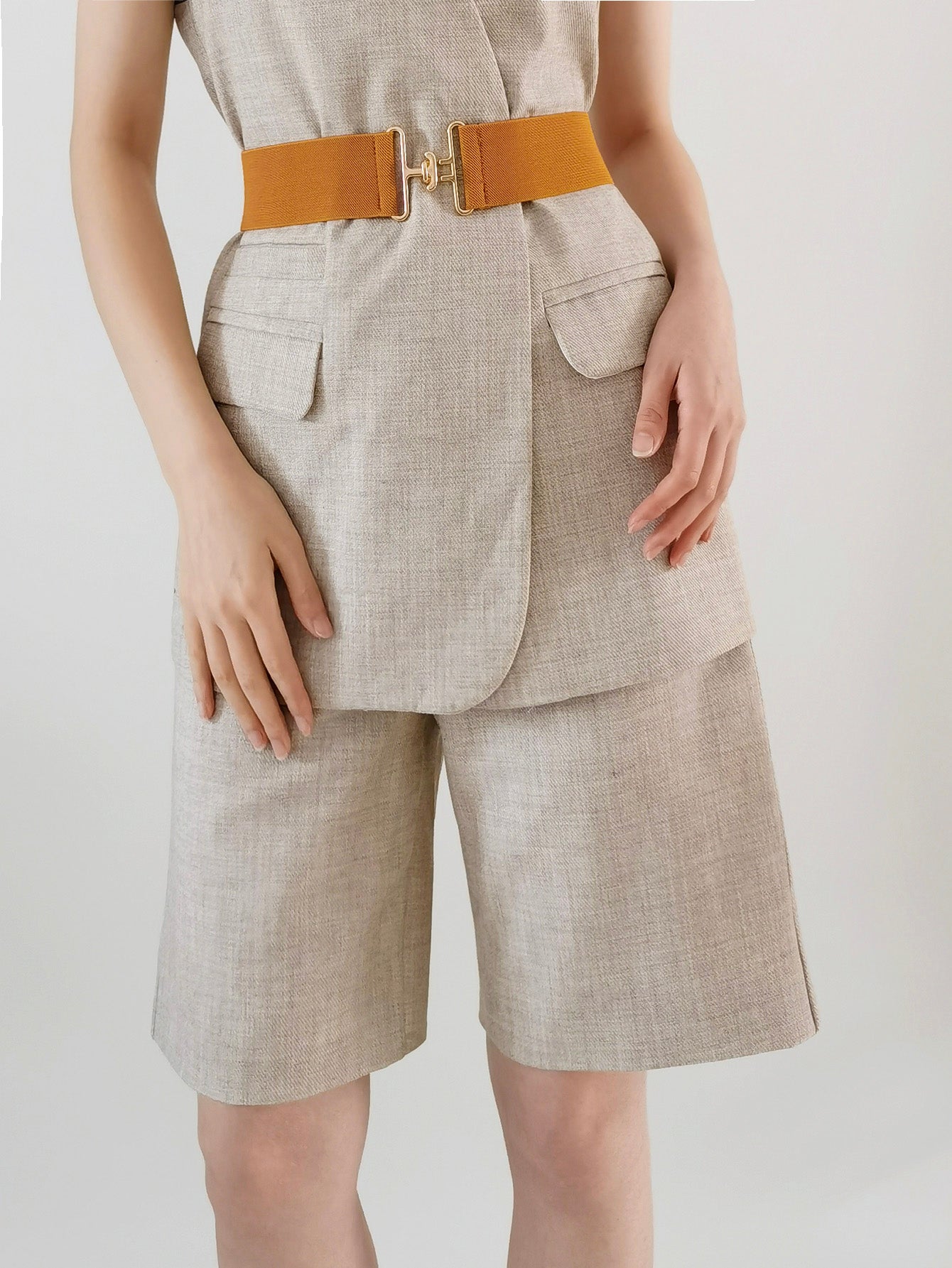 Caramel elastic waist belt with gold sculpted buckle detail