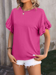 Hot pink textured blouse with ruffle short sleeves and a crew neck.