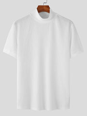 White textured knit mock neck tee with short sleeves.