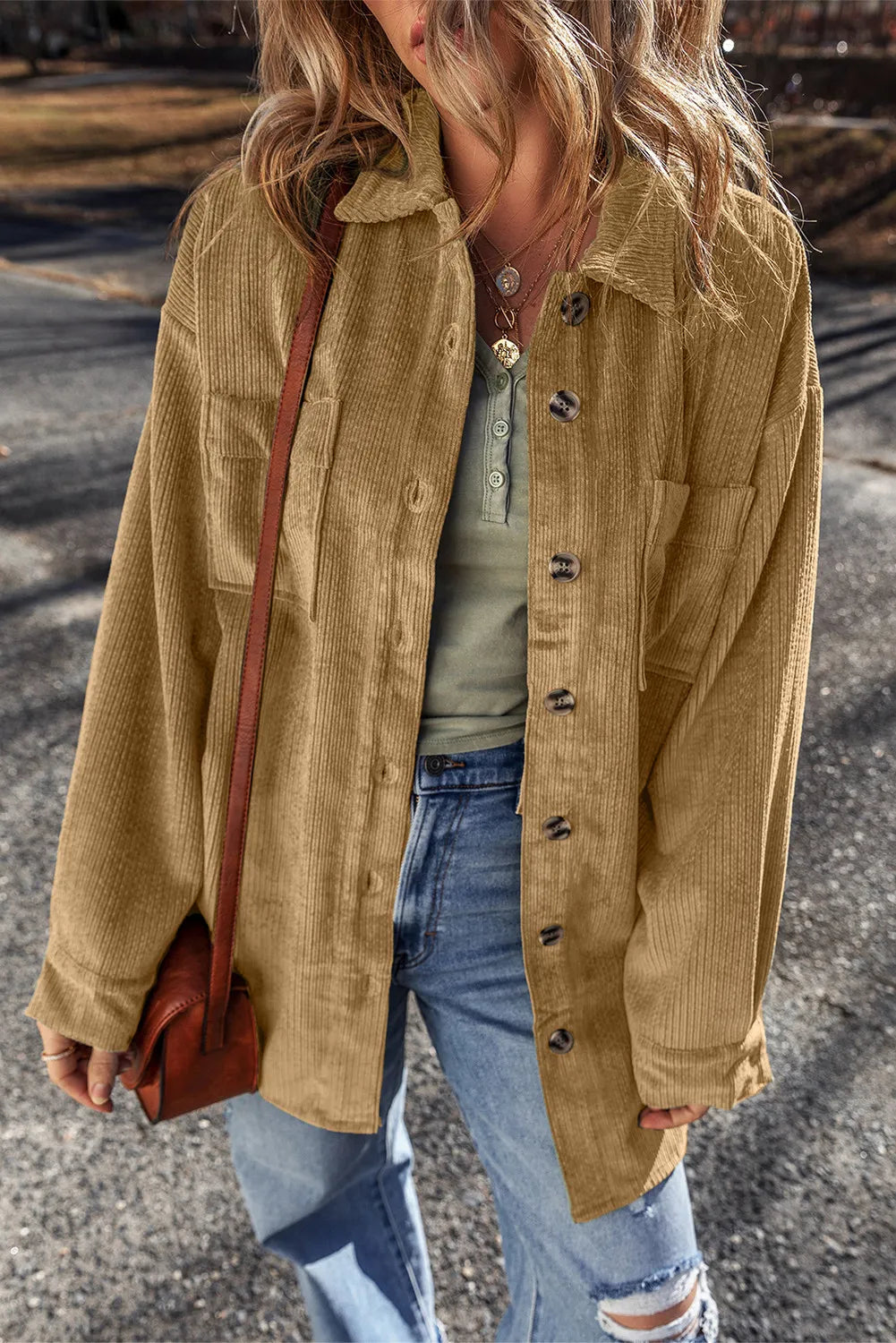 Camel corduroy overshirt with button cuffs and chest pockets.