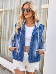 Denim hybrid jacket with grey hooded sleeves, buttoned front, and pockets.