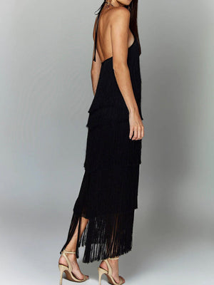 Black halter neck maxi dress with tiered fringe detail and open back.