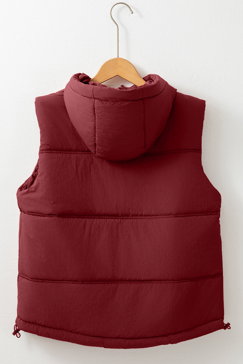 Burgundy quilted hooded puffer vest with drawcord hem detail