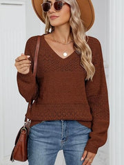 Brown diamond eyelet knit V-neck sweater with long sleeves.