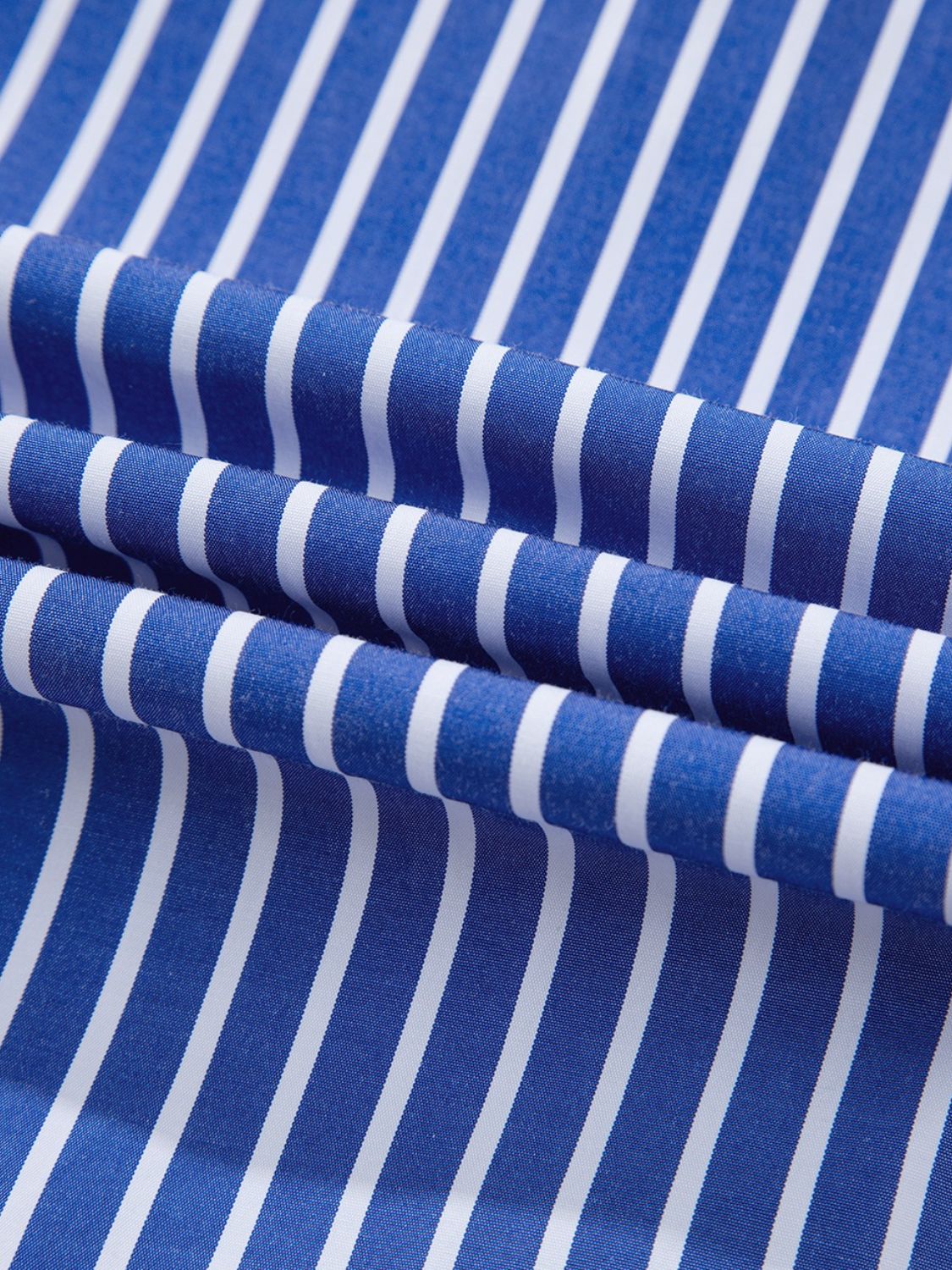 Blue striped blouse with tie-front detail and puff sleeves