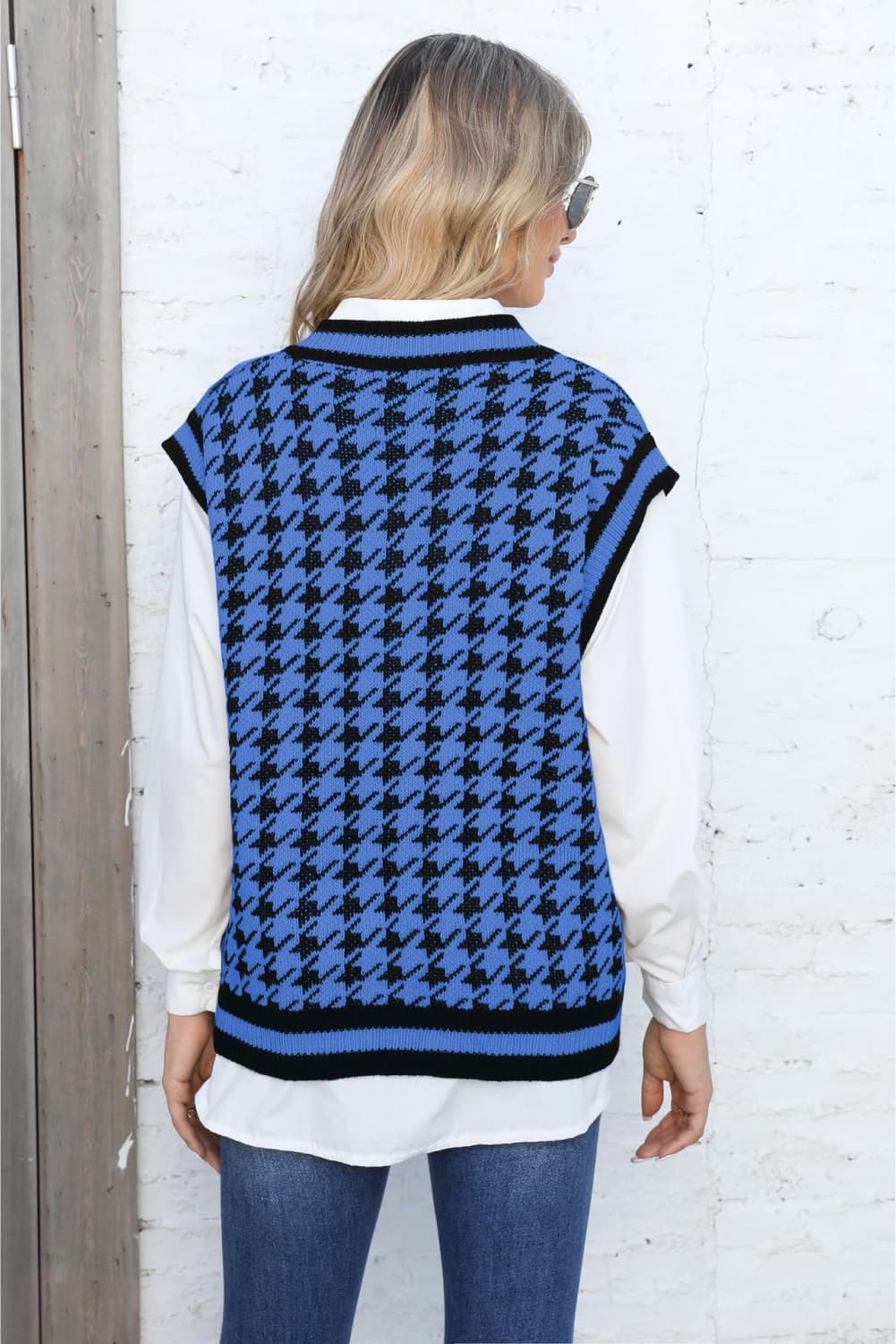 Blue houndstooth knit v-neck vest with black trim, acrylic material