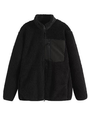 Black sherpa zip-up jacket with mock neck and black patch chest pocket with zipper.