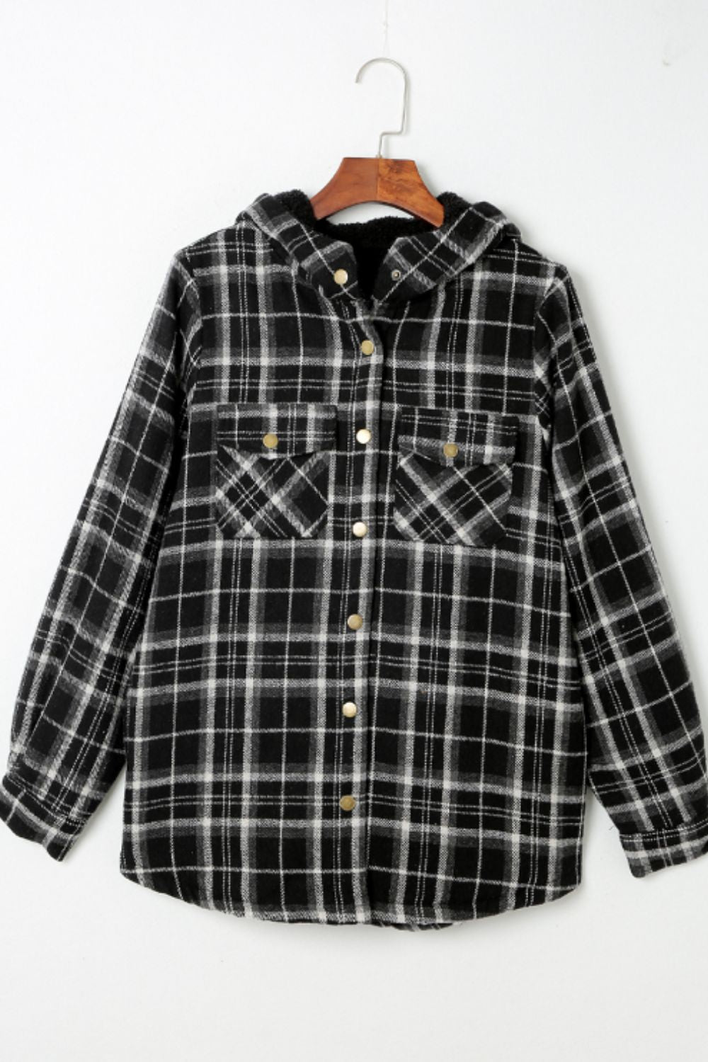 Black plaid sherpa-lined overshirt jacket with button front and chest pockets.