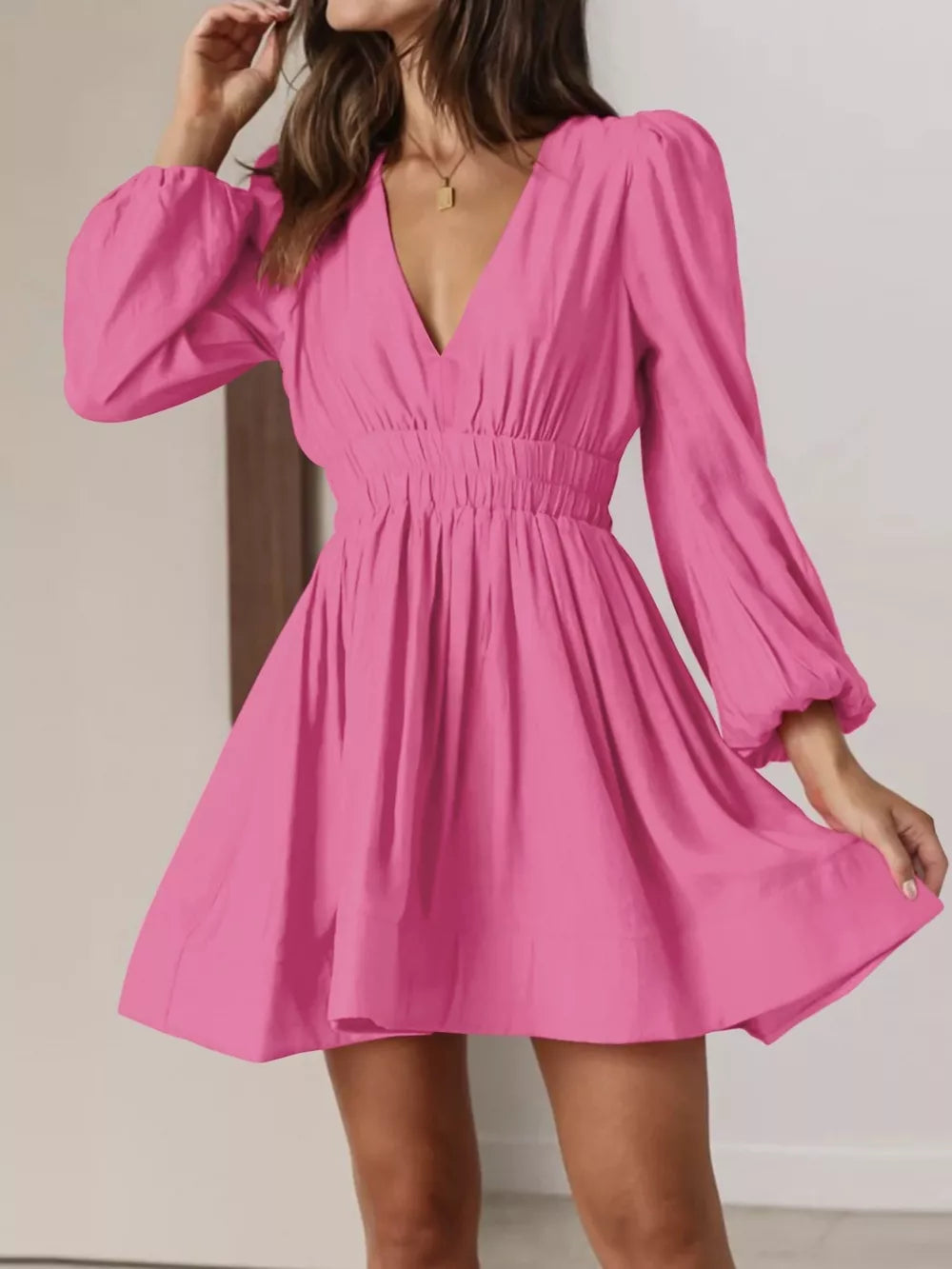Hot Pink V-neck mini dress with puff sleeves and elastic waist