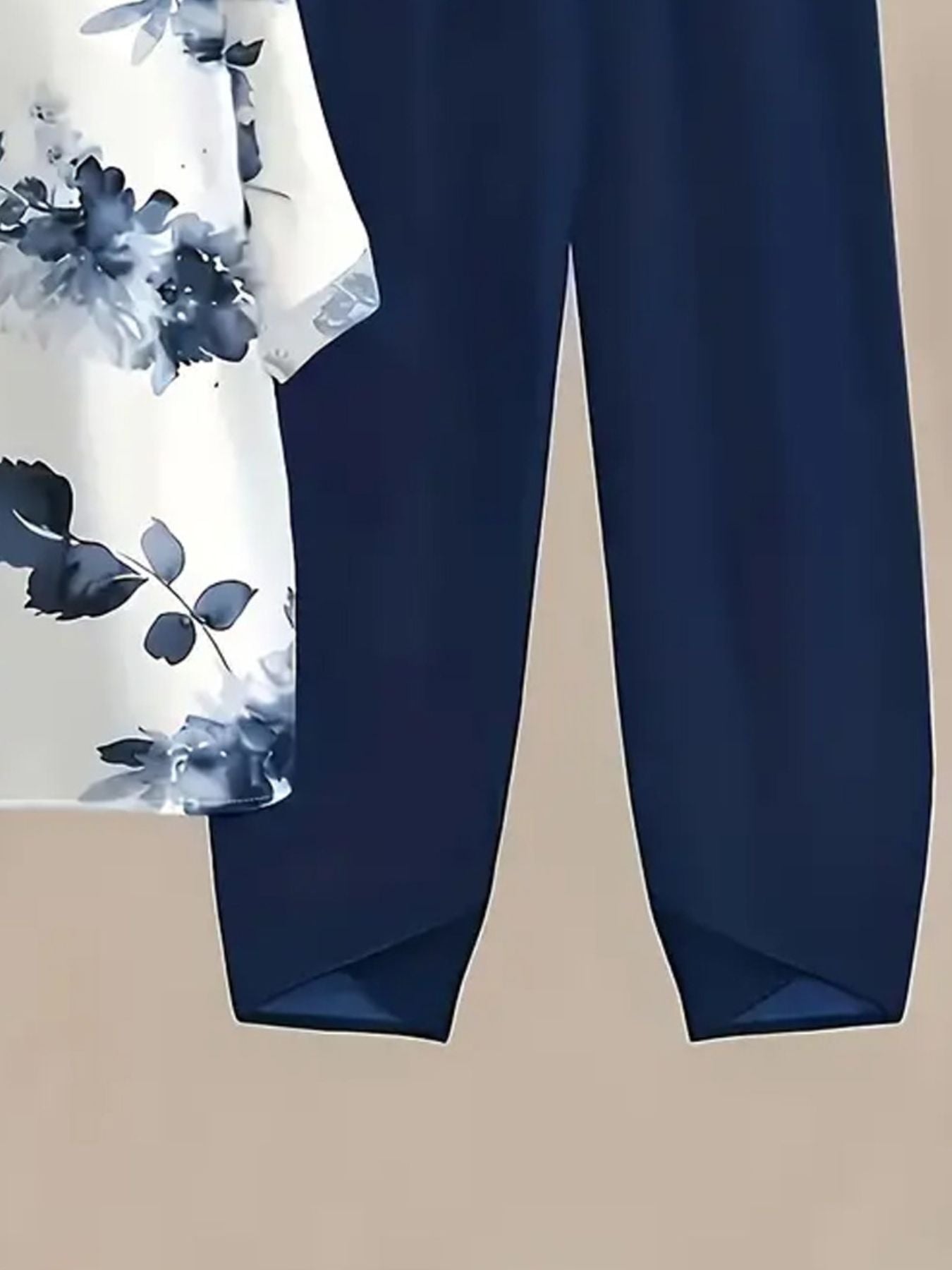 Floral print half sleeve top with dark blue pants set