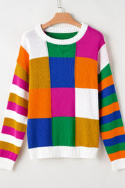Patchwork knit crewneck pullover sweater with colorful blocks and striped sleeves.