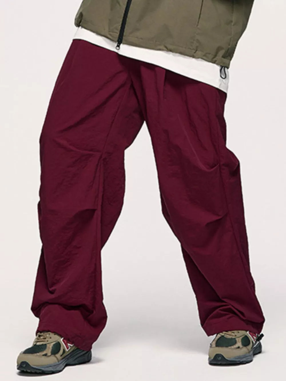 Wine red cargo joggers with drawstring detail and relaxed fit.