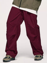 Wine red cargo joggers with drawstring detail and relaxed fit.