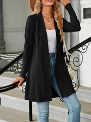Black textured knit longline cardigan with buttons, open front, long sleeves.
