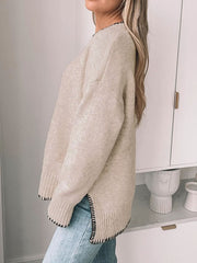 Khaki crew neck sweater with contrast stitch detail on neckline and hem.