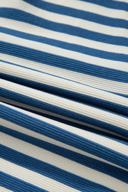 Textured stripe henley top in peacock blue and white with a waffle knit fabric detail.