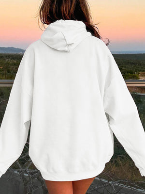 Oversized white hoodie with pouch pocket and drawstring hood.