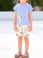 Children's lavender cat graphic t-shirt and cream cartoon house print shorts set.