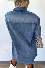 Acid-washed denim dress with classic collar and button-down front, relaxed fit.