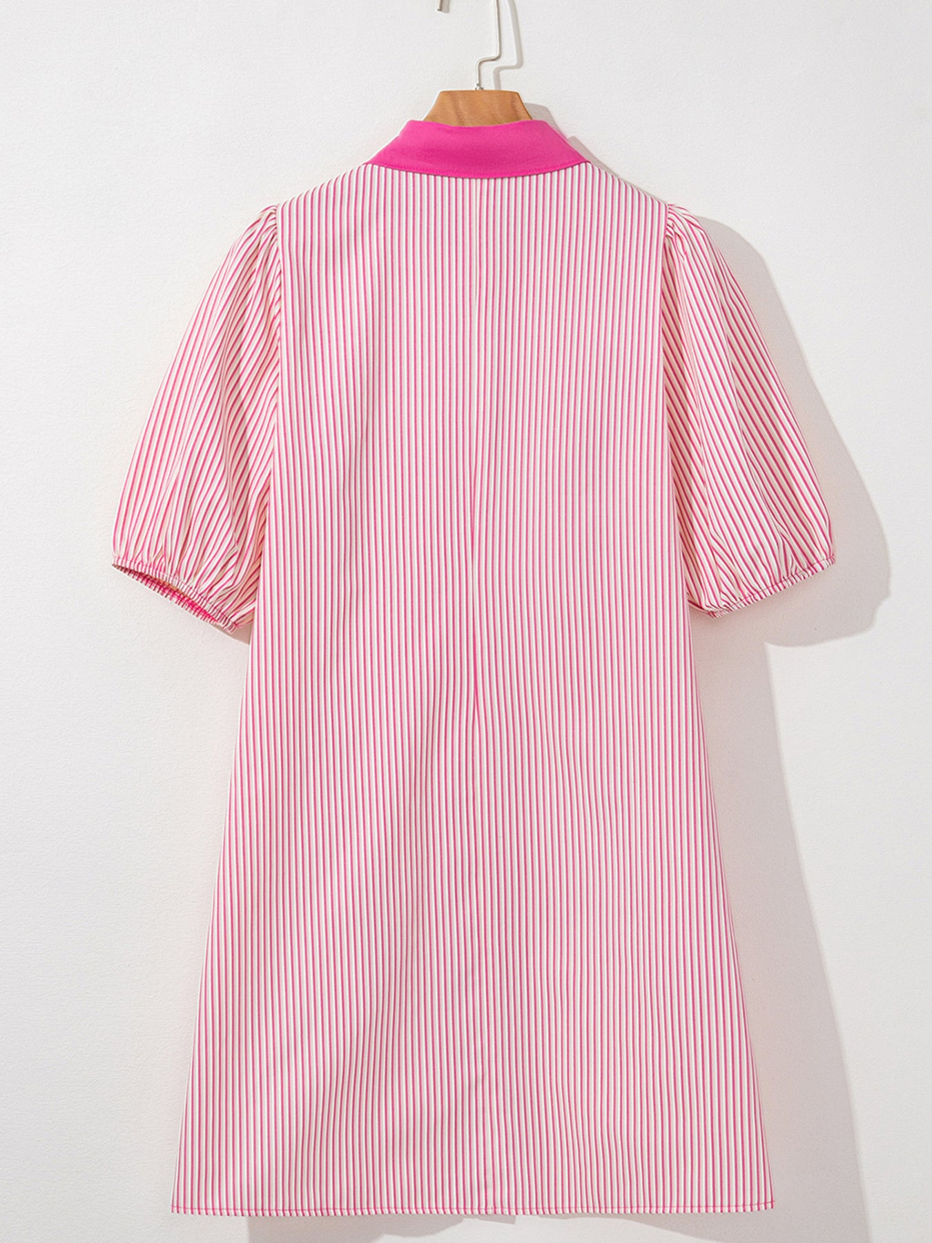 Button-down mini dress in pink and white stripe cotton with puff sleeves and a bright pink collar.