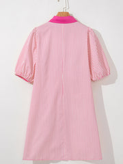 Button-down mini dress in pink and white stripe cotton with puff sleeves and a bright pink collar.