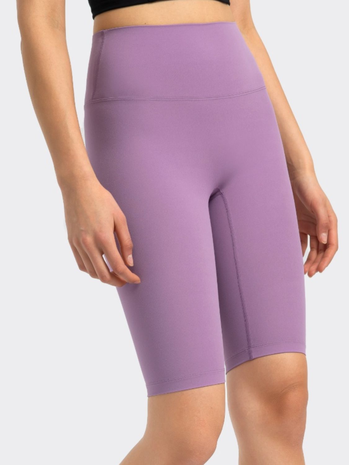 Lavender activewear cycling shorts with a high waist and seamless design.